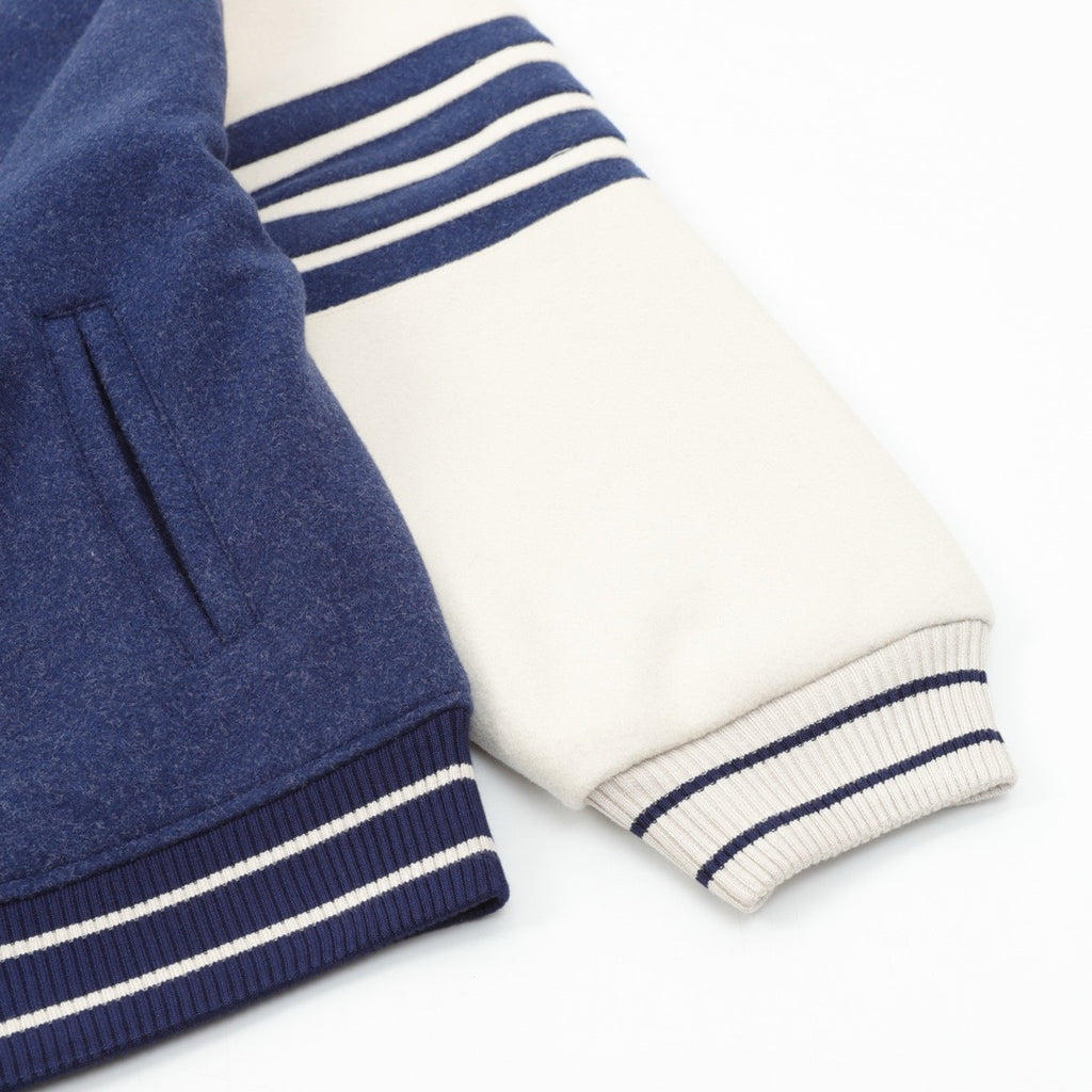 Thom Browne Women's & Men's Navy & White Split 4-Bar Varsity Jacket