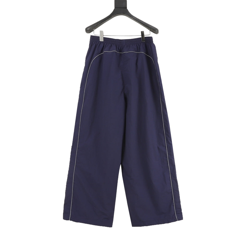 Balenciaga BLCG Bodies Athletic Pants — Navy, Wide-Leg Windbreaker