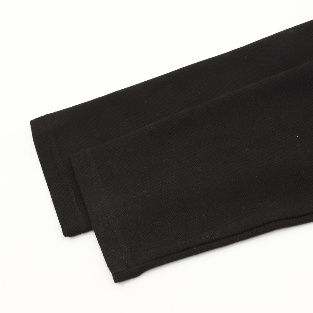 AMI Paris Long-Sleeve Polo Shirt — Tonal Heart Logo, Black | FW25