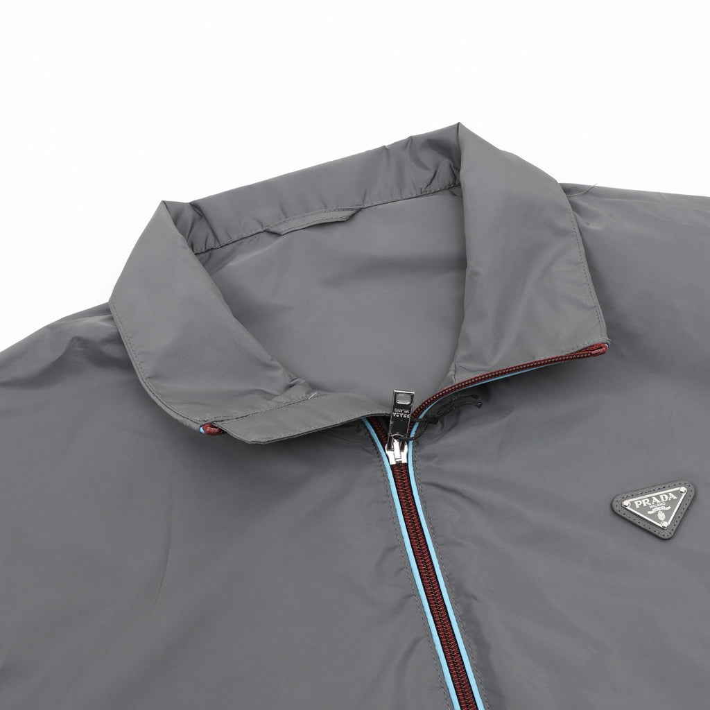 Prada Triangle Logo Iridescent Zip Nylon Stand Collar Jacket | Grey Lightweight Luxury Outerwear
