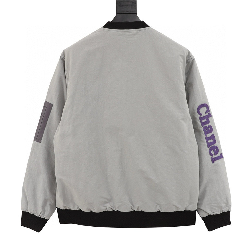 Chanel Reversible Quilted Cotton Jacket with Embroidered Slogan and Vintage-Style Zipper